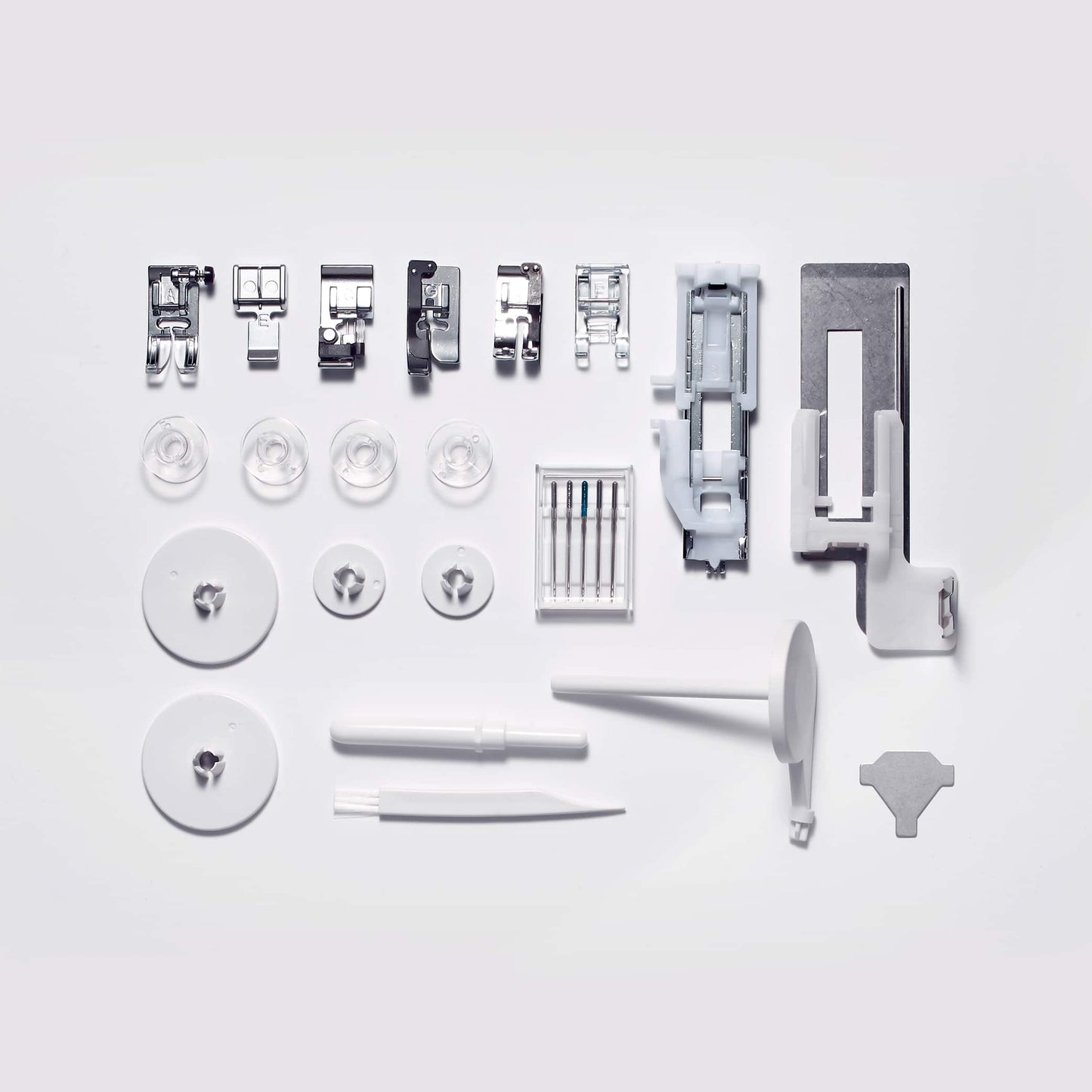 Elna Excellence 570a includes Alphabet, Extension Table, and Hard Case