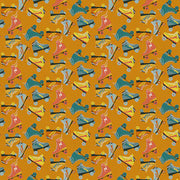 Jurassic Joyrides Skate Toss - Orange from the Jurassic Joyful Collection by Paintbrush Studios - 100% Cotton