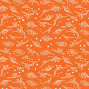 Mini Dino Skeletons in Orange from the Glow-O-Saurus Collection by Kanvas Studios for Benartex Fabrics by the Yard - 100% Cotton